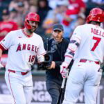 May 21, 2026; Anaheim, California, USA; Los Angeles Angels first baseman Nolan Schanuel (18) is greeted by right fielder Jo Adell (7) after hitting a two-run home run during the first inning against the Athletics at Angel Stadium. Mandatory Credit: William Liang-Imagn Images