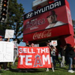 May 23, 2026; Anaheim, California, USA; Los Angeles Angels fans gather outside Angel Stadium before the game between the Los Angeles Angels and the Texas Rangers to protest the Angels team owner Arte Moreno. Mandatory Credit: Kiyoshi Mio-Imagn Images