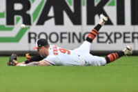 May 24, 2026; Baltimore, Maryland, USA; Baltimore Orioles outfielder Tyler O'Neill (9) is unable to make a diving catch of a short fly ball in the sixth inning against the Detroit Tigers at Oriole Park at Camden Yards. Mandatory Credit: Jamie Sabau-Imagn Images