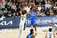 May 24, 2026; San Antonio, Texas, USA; Oklahoma City Thunder guard Shai Gilgeous-Alexander (2) shoots while defended by San Antonio Spurs center Victor Wembanyama (1) in the first quarter during game four of the western conference finals for the 2026 NBA playoffs at Frost Bank Center. Mandatory Credit: Scott Wachter-Imagn Images