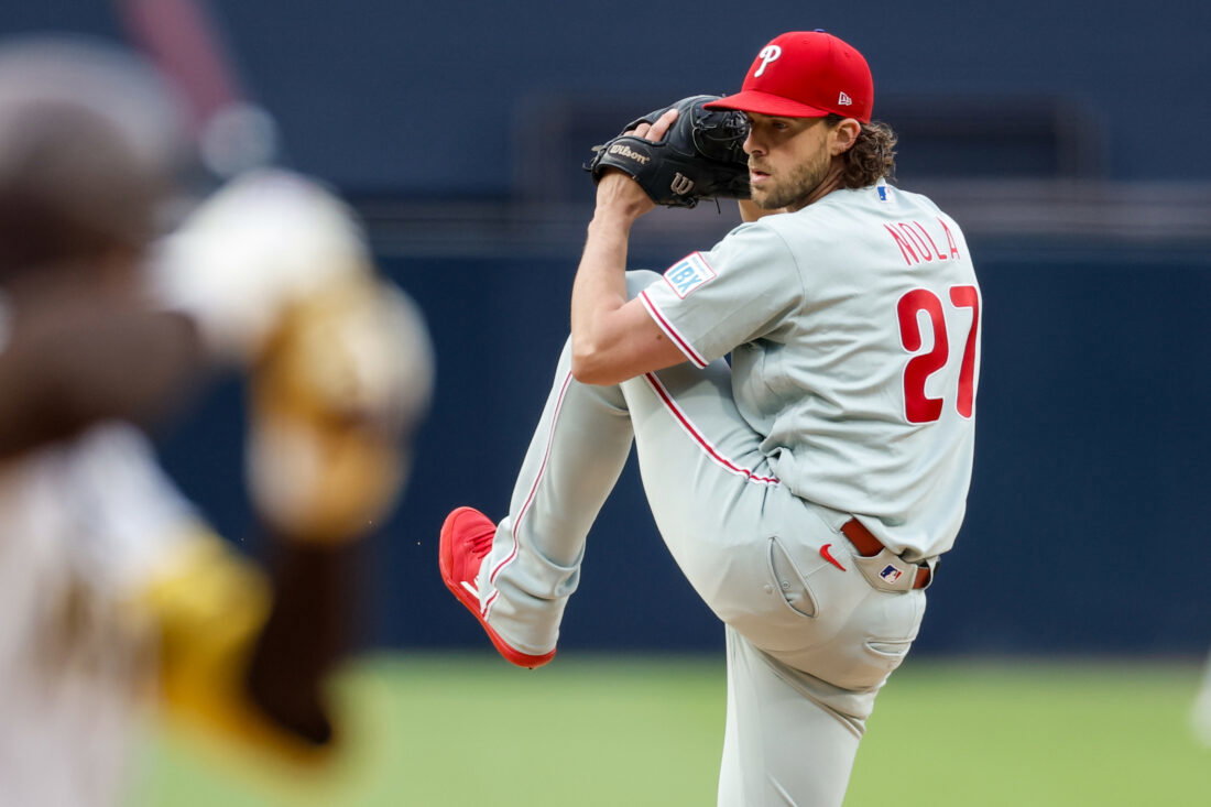 May 26, 2026; San Diego, California, USA; Philadelphia Phillies starting pitcher Aaron Nola (27) throws a pitch during the first inning against the San Diego Padres at Petco Park. Mandatory Credit: David Frerker-Imagn Images