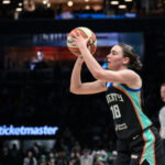 May 29, 2026; Brooklyn, New York, USA; New York Liberty guard Pauline Astier (18) shoots the ball against the Phoenix Mercury during the first half at Barclays Center. Mandatory Credit: John Jones-Imagn Images