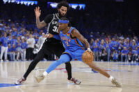 May 30, 2026; Oklahoma City, Oklahoma, USA; Oklahoma City Thunder guard Shai Gilgeous-Alexander (2) controls the ball against San Antonio Spurs forward Julian Champagnie (30) in the fourth quarter during game seven of the western conference finals for the 2026 NBA playoffs at Paycom Center. Mandatory Credit: Alonzo Adams-Imagn Images