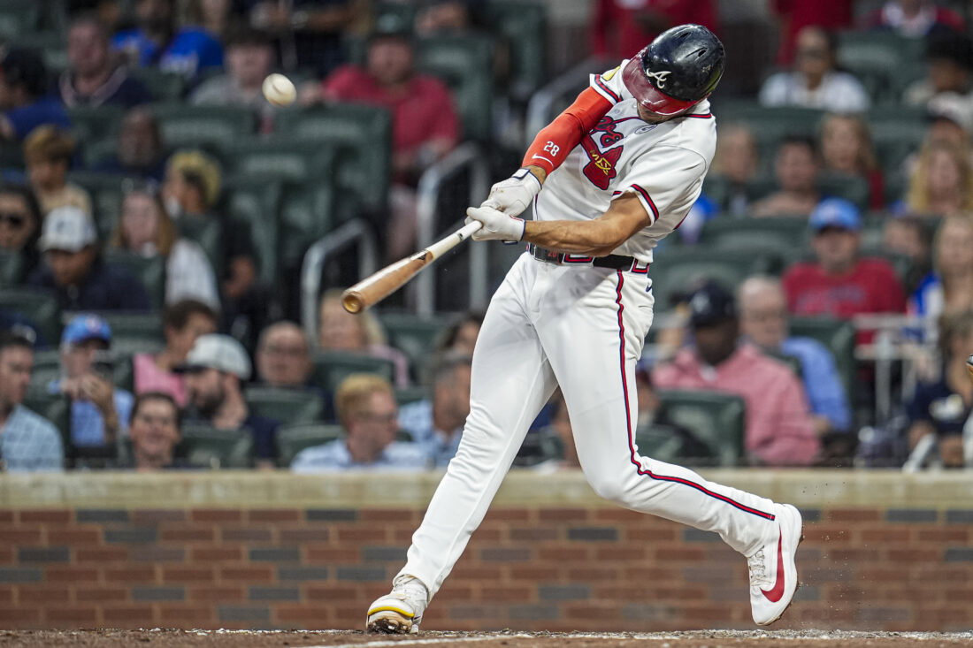 Jun 2, 2026; Cumberland, Georgia, USA; Atlanta Braves first baseman Matt Olson (28) hits a home run against the Toronto Blue Jays during the sixth inning at Truist Park. Mandatory Credit: Dale Zanine-Imagn Images