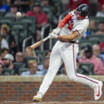 Jun 2, 2026; Cumberland, Georgia, USA; Atlanta Braves first baseman Matt Olson (28) hits a home run against the Toronto Blue Jays during the sixth inning at Truist Park. Mandatory Credit: Dale Zanine-Imagn Images
