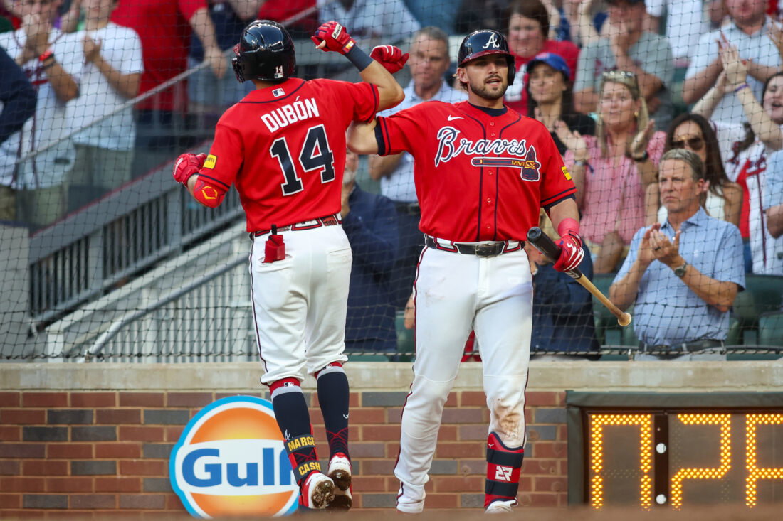 Jun 5, 2026; Atlanta, Georgia, USA; Atlanta Braves shortstop Mauricio Dubon (14) celebrates with third baseman Austin Riley (27) after a two-run home run against the Pittsburgh Pirates in the third inning at Truist Park. Mandatory Credit: Brett Davis-Imagn Images