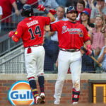 Jun 5, 2026; Atlanta, Georgia, USA; Atlanta Braves shortstop Mauricio Dubon (14) celebrates with third baseman Austin Riley (27) after a two-run home run against the Pittsburgh Pirates in the third inning at Truist Park. Mandatory Credit: Brett Davis-Imagn Images