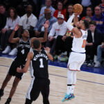 Jun 8, 2026; New York, New York, USA; New York Knicks guard Jalen Brunson (11) shoots against San Antonio Spurs guard De'aaron Fox (4) in the fourth quarter during game three of the 2026 NBA Finals at Madison Square Garden. Mandatory Credit: Vincent Carchietta-Imagn Images