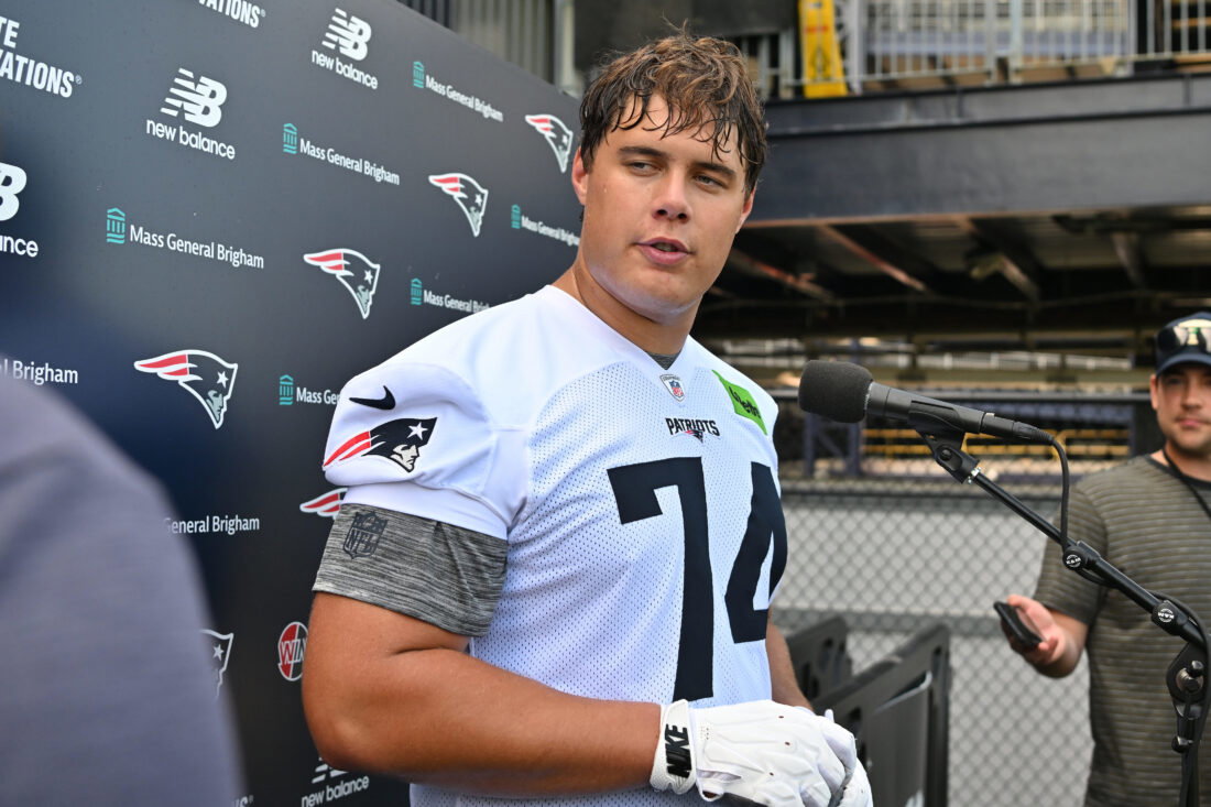Jun 10, 2026; Foxborough, MA, USA; New England Patriots tackle Caleb Lomu (74) speaks to the media after minicamp at Gillette Stadium. Mandatory Credit: Eric Canha-Imagn Images