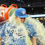 Jun 12, 2026; Milwaukee, Wisconsin, USA; Milwaukee Brewers pitcher Jacob Misiorowski (32) is doused with Gatorade by outfielder Garrett Mitchell (5) after pitching all nine innings of a 6-0 win over the Philadelphia Phillies at American Family Field. Mandatory Credit: Michael McLoone-Imagn Images