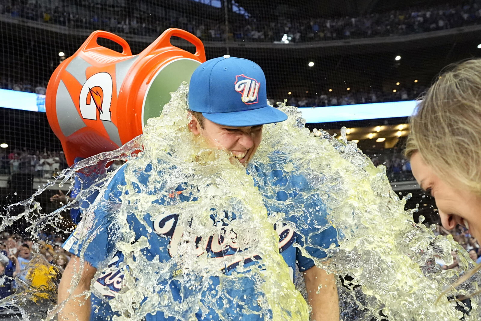 Jun 12, 2026; Milwaukee, Wisconsin, USA; Milwaukee Brewers pitcher Jacob Misiorowski (32) is doused with Gatorade by outfielder Garrett Mitchell (5) after pitching all nine innings of a 6-0 win over the Philadelphia Phillies at American Family Field. Mandatory Credit: Michael McLoone-Imagn Images