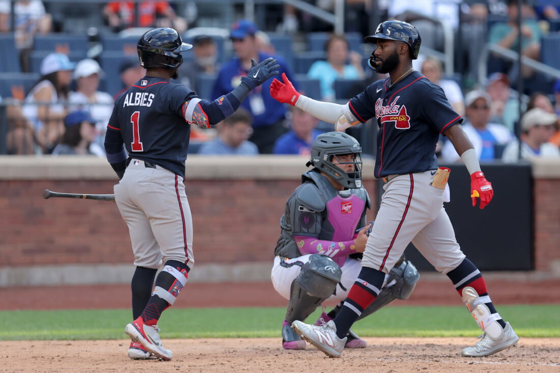 Jun 13, 2026; New York City, New York, USA; Atlanta Braves center fielder Michael Harris II (23) celebrates with on base hitter Ozzie Albies (1) after hitting a solo home run against the New York Mets during the eighth inning at Citi Field. Mandatory Credit: Brad Penner-Imagn Images