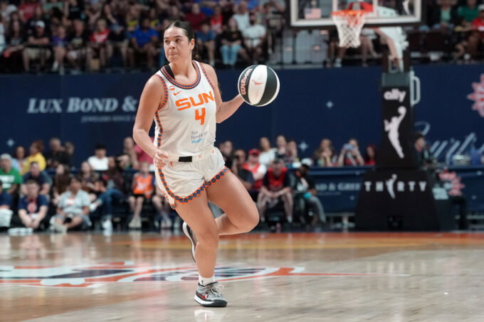 Jun 13, 2026; Uncasville, Connecticut, USA; Connecticut Sun guard Charlisse Leger-Walker (4) dribbles the ball against the Indiana Fever during the first half at Mohegan Sun Arena. Mandatory Credit: Gregory Fisher-Imagn Images