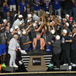 Jun 13, 2026; San Antonio, Texas, USA; New York Knicks owner James Nolan and the team celebrate after the Knicks defeat the San Antonio Spurs during game five of the 2026 NBA Finals at Frost Bank Center. Mandatory Credit: Scott Wachter-Imagn Images