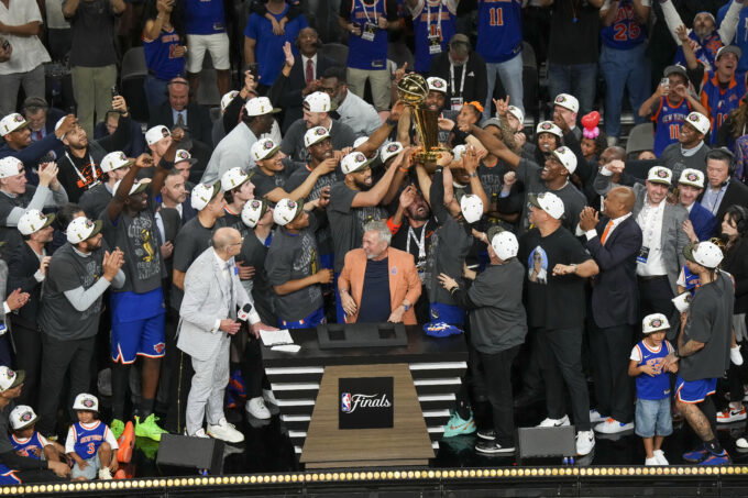 Jun 13, 2026; San Antonio, Texas, USA; New York Knicks owner James Nolan and the team celebrate after the Knicks defeat the San Antonio Spurs during game five of the 2026 NBA Finals at Frost Bank Center. Mandatory Credit: Scott Wachter-Imagn Images
