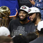Jun 13, 2026; San Antonio, Texas, USA; New York Knicks center Karl-Anthony Towns (32) and guard Jalen Brunson (11) celebrates with his teammates after the Knicks defeat the San Antonio Spurs during game five of the 2026 NBA Finals at Frost Bank Center. Mandatory Credit: Geoff Burke-Imagn Images