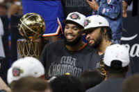 Jun 13, 2026; San Antonio, Texas, USA; New York Knicks center Karl-Anthony Towns (32) and guard Jalen Brunson (11) celebrates with his teammates after the Knicks defeat the San Antonio Spurs during game five of the 2026 NBA Finals at Frost Bank Center. Mandatory Credit: Geoff Burke-Imagn Images