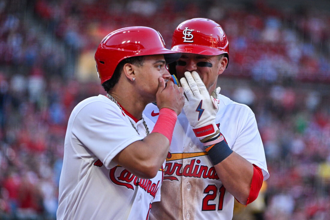 Jun 15, 2026; St. Louis, Missouri, USA; St. Louis Cardinals shortstop Masyn Winn (0) talks with left fielder Lars Nootbaar (21) after they both scored against the San Diego Padres during the fourth inning at Busch Stadium. Mandatory Credit: Jeff Curry-Imagn Images