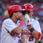 Jun 15, 2026; St. Louis, Missouri, USA; St. Louis Cardinals shortstop Masyn Winn (0) talks with left fielder Lars Nootbaar (21) after they both scored against the San Diego Padres during the fourth inning at Busch Stadium. Mandatory Credit: Jeff Curry-Imagn Images