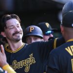 Jun 17, 2026; West Sacramento, California, USA; Pittsburgh Pirates left fielder Bryan Reynolds (10) celebrates with teammates after scoring against the Athletics during the first inning at Sutter Health Park. Mandatory Credit: Ed Szczepanski-Imagn Images
