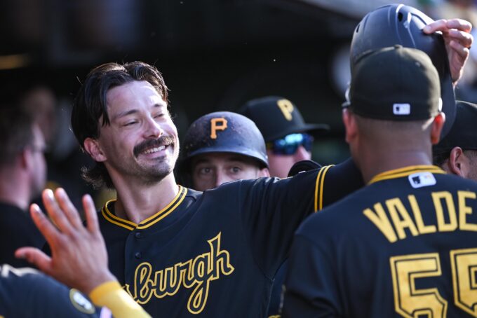 Jun 17, 2026; West Sacramento, California, USA; Pittsburgh Pirates left fielder Bryan Reynolds (10) celebrates with teammates after scoring against the Athletics during the first inning at Sutter Health Park. Mandatory Credit: Ed Szczepanski-Imagn Images