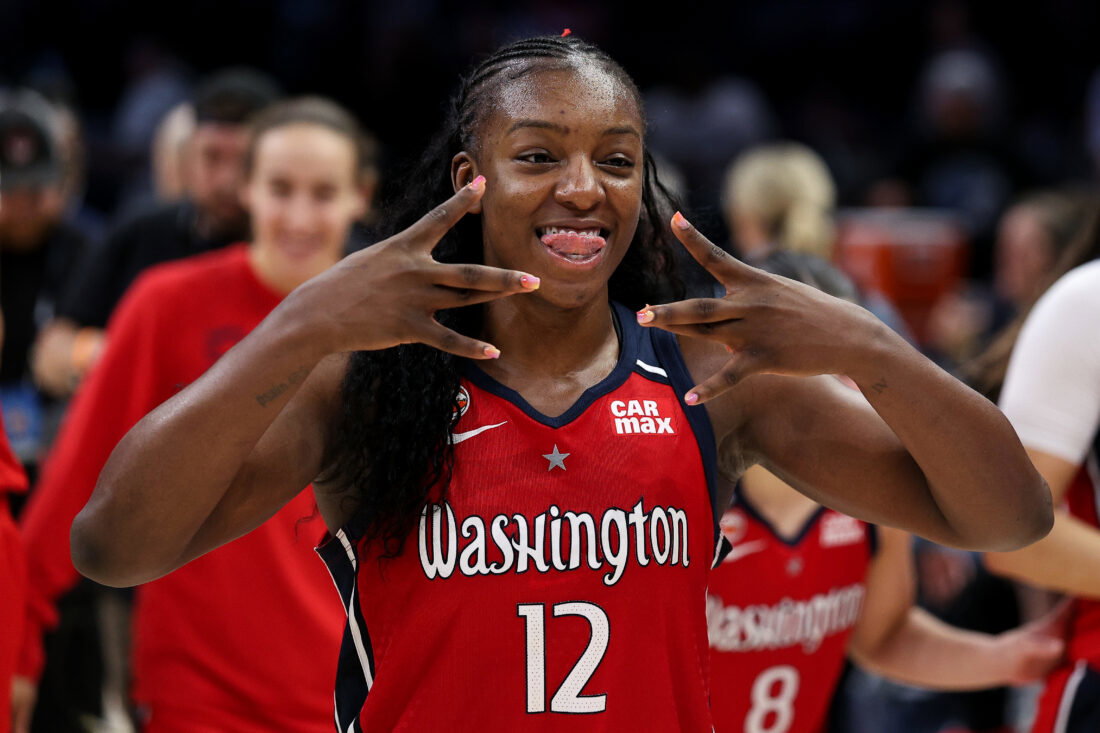 Jun 21, 2026; Minneapolis, Minnesota, USA; Washington Mystics forward Michaela Onyenwere (12) celebrates the teams win against the Minnesota Lynx during the second half at Target Center. Mandatory Credit: Matt Krohn-Imagn Images
