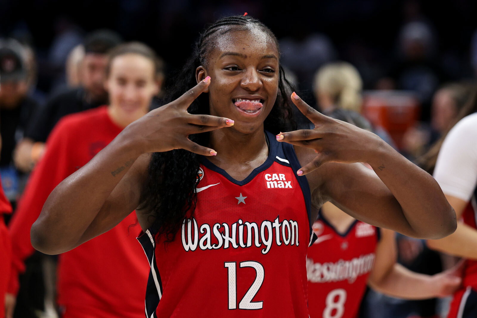 Jun 21, 2026; Minneapolis, Minnesota, USA; Washington Mystics forward Michaela Onyenwere (12) celebrates the teams win against the Minnesota Lynx during the second half at Target Center. Mandatory Credit: Matt Krohn-Imagn Images