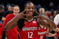 Jun 21, 2026; Minneapolis, Minnesota, USA; Washington Mystics forward Michaela Onyenwere (12) celebrates the teams win against the Minnesota Lynx during the second half at Target Center. Mandatory Credit: Matt Krohn-Imagn Images