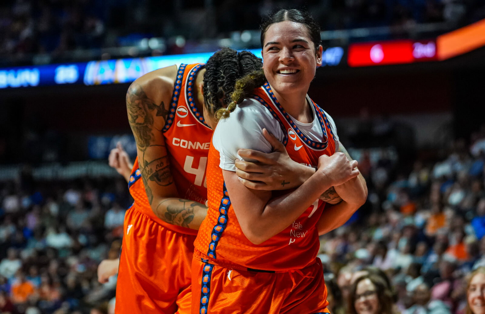 Jun 22, 2026; Uncasville, Connecticut, USA; Connecticut Sun guard Charlisse Leger-Walker (4) and center Brittney Griner (42) react after a play against the Chicago Sky in the first half at Mohegan Sun Arena. Mandatory Credit: David Butler II-Imagn Images