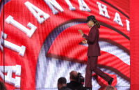 Jun 23, 2026; New York, NY, USA; The eighth pick in the 2026 NBA draft, Houston guard Kingston Flemings after he was selected by the Atlanta Hawks at Barclays Center. Mandatory Credit: Brad Penner-Imagn Images