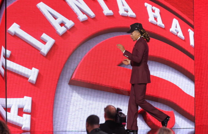 Jun 23, 2026; New York, NY, USA; The eighth pick in the 2026 NBA draft, Houston guard Kingston Flemings after he was selected by the Atlanta Hawks at Barclays Center. Mandatory Credit: Brad Penner-Imagn Images