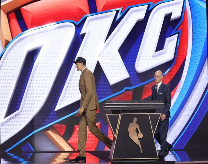 Jun 23, 2026; New York, NY, USA; NBA commissioner Adam Silver greets the twelfth pick in the 2026 NBA draft, Michigan center Aday Mara after he was selected by the Oklahoma City Thunder at Barclays Center. Mandatory Credit: Brad Penner-Imagn Images