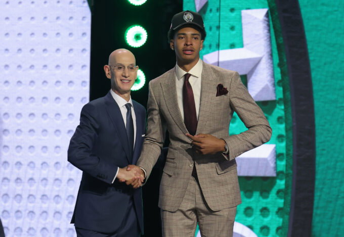 Jun 23, 2026; New York, NY, USA; NBA commissioner Adam Silver greets the twenty seventh pick in the 2026 NBA draft, Houston forward Chris Cenac Jr. after he was selected by the Boston Celtics at Barclays Center. Mandatory Credit: Brad Penner-Imagn Images