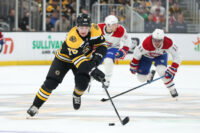 Mar 23, 2023; Boston, Massachusetts, USA; Boston Bruins defenseman Connor Clifton (75) possesses the puck during the third period against the Montreal Canadiens at TD Garden. Mandatory Credit: Paul Rutherford-USA TODAY Sports