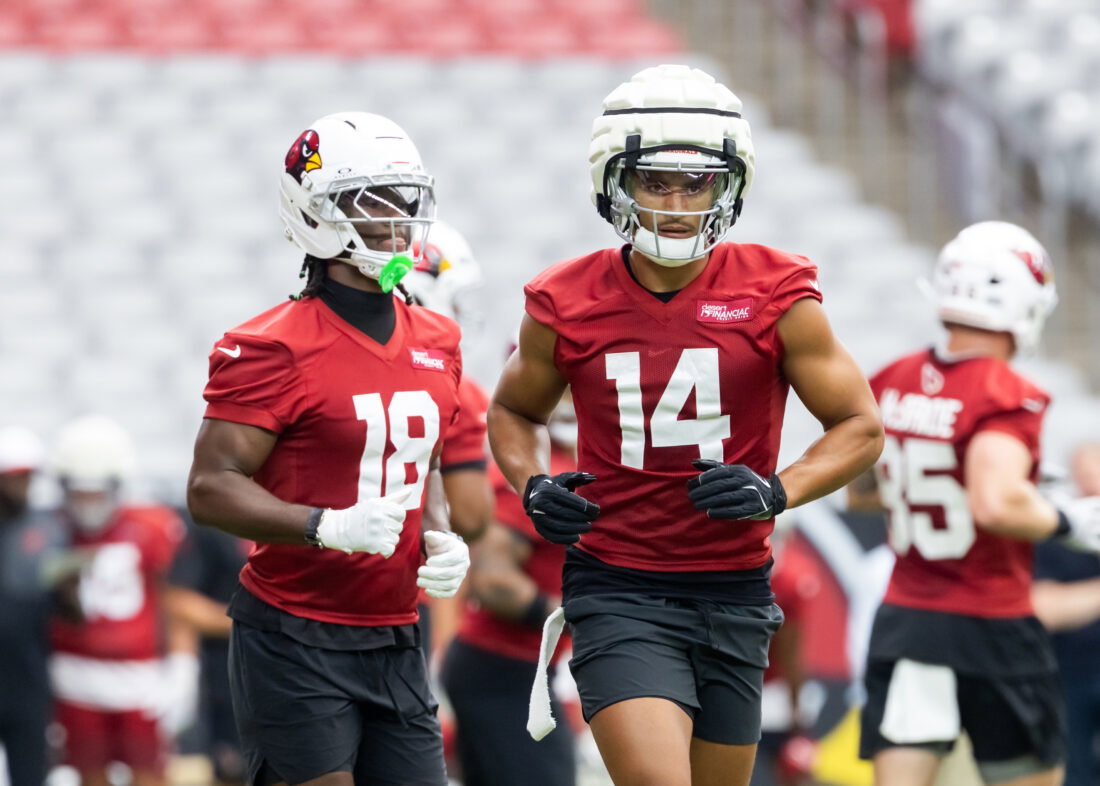 Jul 24, 2025; Glendale, AZ, USA; Arizona Cardinals wide receiver Michael Wilson (14) and Marvin Harrison Jr. (18) during training camp at State Farm Stadium. Mandatory Credit: Mark J. Rebilas-Imagn Images