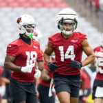 Jul 24, 2025; Glendale, AZ, USA; Arizona Cardinals wide receiver Michael Wilson (14) and Marvin Harrison Jr. (18) during training camp at State Farm Stadium. Mandatory Credit: Mark J. Rebilas-Imagn Images