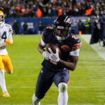 Jan 10, 2026; Chicago, IL, USA; Chicago Bears wide receiver DJ Moore (2) makes the eventual game winning touchdown catch against the Green Bay Packers during the second half of an NFC Wild Card Round game at Soldier Field. Mandatory Credit: David Banks-Imagn Images