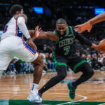 Apr 28, 2026; Boston, Massachusetts, USA; Boston Celtics guard Jaylen Brown (7) makes space against Philadelphia 76ers forward Paul George (8) in the second half during game five of the first round of the 2026 NBA Playoffs at TD Garden. Mandatory Credit: David Butler II-Imagn Images