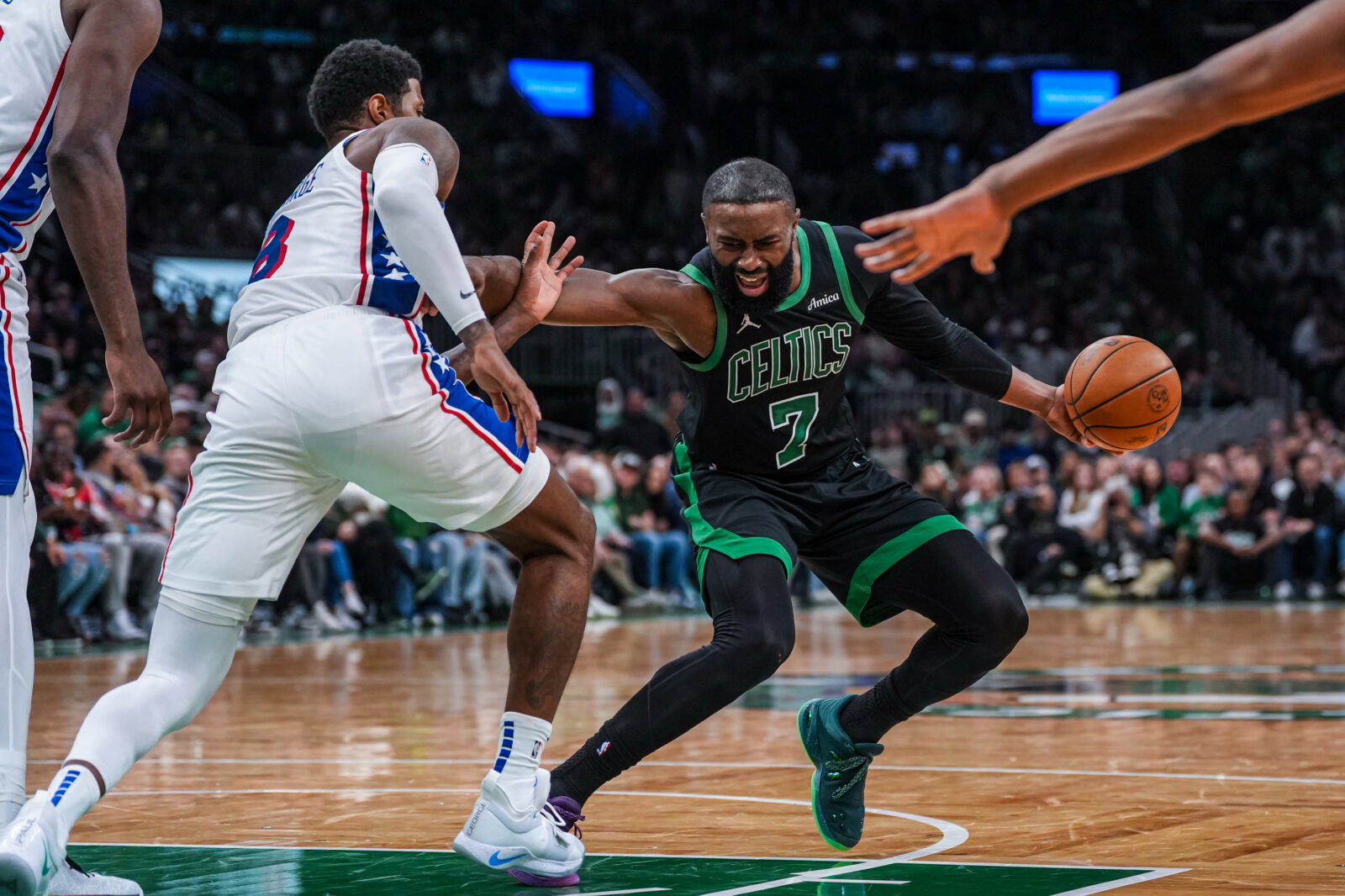 Apr 28, 2026; Boston, Massachusetts, USA; Boston Celtics guard Jaylen Brown (7) makes space against Philadelphia 76ers forward Paul George (8) in the second half during game five of the first round of the 2026 NBA Playoffs at TD Garden. Mandatory Credit: David Butler II-Imagn Images