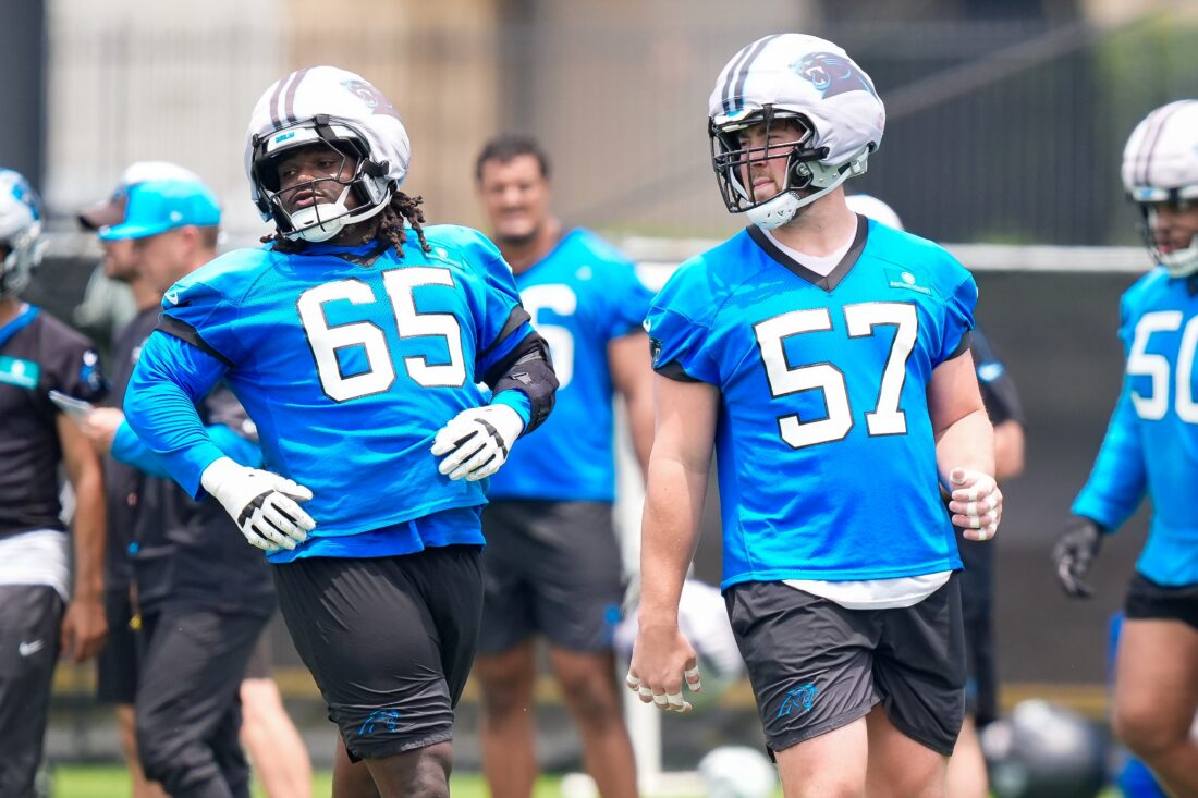Jun 9, 2026; Charlotte, NC, USA; Carolina Panthers tackle Monroe Freeling (57) and guard Ja´Tyre Carter (65) during the first day of mini camp at Bank of America Stadium practice facility. Mandatory Credit: Jim Dedmon-Imagn Images