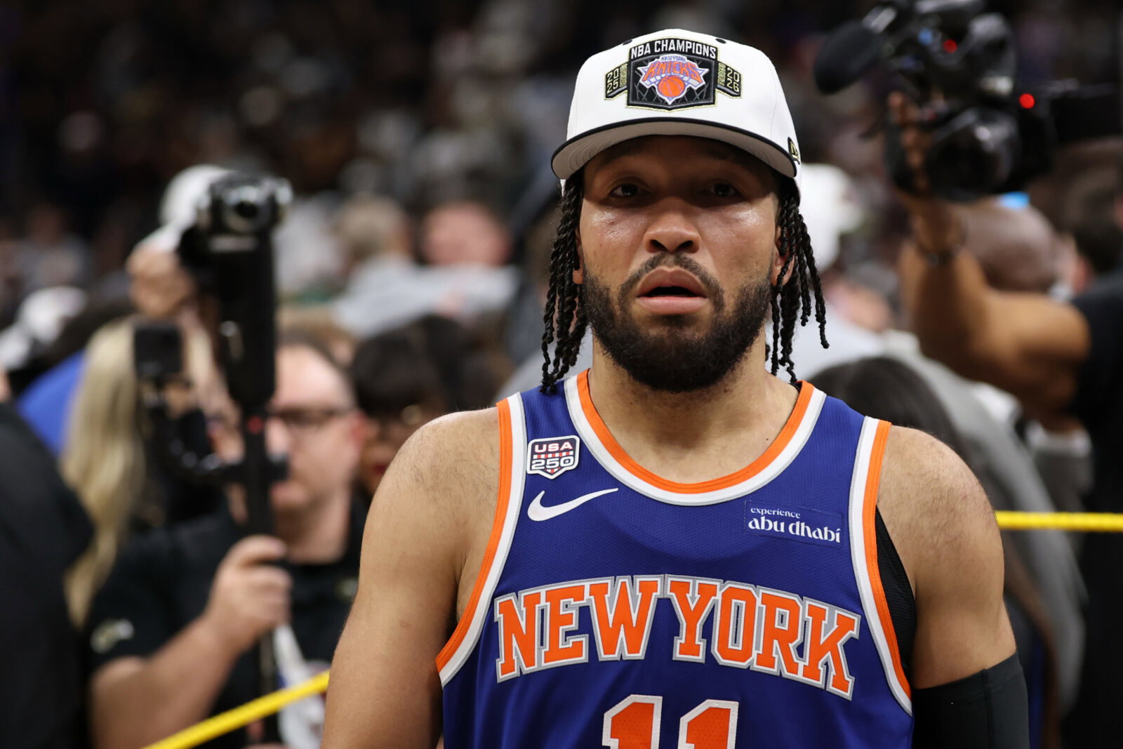 Jun 13, 2026; San Antonio, Texas, USA; New York Knicks guard Jalen Brunson (11) walks to the end of the court prior to the championship trophy celebration after game five of the 2026 NBA Finals against the San Antonio Spurs at Frost Bank Center. Mandatory Credit: Geoff Burke-Imagn Images