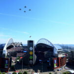 Soccer Football - FIFA World Cup 2026 - Round of 16 - United States v Belgium - Fans gather in Seattle - Seattle, Washington, U.S. - July 6, 2026 General view during a military fly-over outside the stadium as fans gather in Seattle before the match IMAGN IMAGES via Reuters/Kevin Ng TPX IMAGES OF THE DAY
