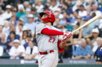 Jul 21, 2026; Seattle, Washington, USA; Cincinnati Reds first baseman Sal Stewart (27) hits an RBI-sacrifice fly against the Seattle Mariners during the fifth inning at T-Mobile Park. Mandatory Credit: Joe Nicholson-Imagn Images