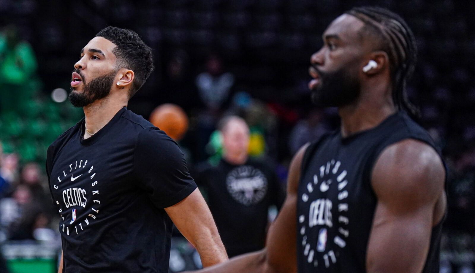 Jan 10, 2025; Boston, Massachusetts, USA; Boston Celtics forward Jayson Tatum (0) and guard Jaylen Brown (7) warm up before the start of the game against the Sacramento Kings at TD Garden. Mandatory Credit: