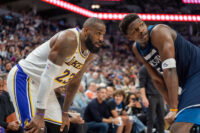 Apr 27, 2025; Minneapolis, Minnesota, USA; Minnesota Timberwolves guard Anthony Edwards (5) guards Los Angeles Lakers forward LeBron James (23) in the second quarter during game four of first round for the 2025 NBA Playoffs at Target Center. Mandatory Credit: Matt Blewett-Imagn Images
