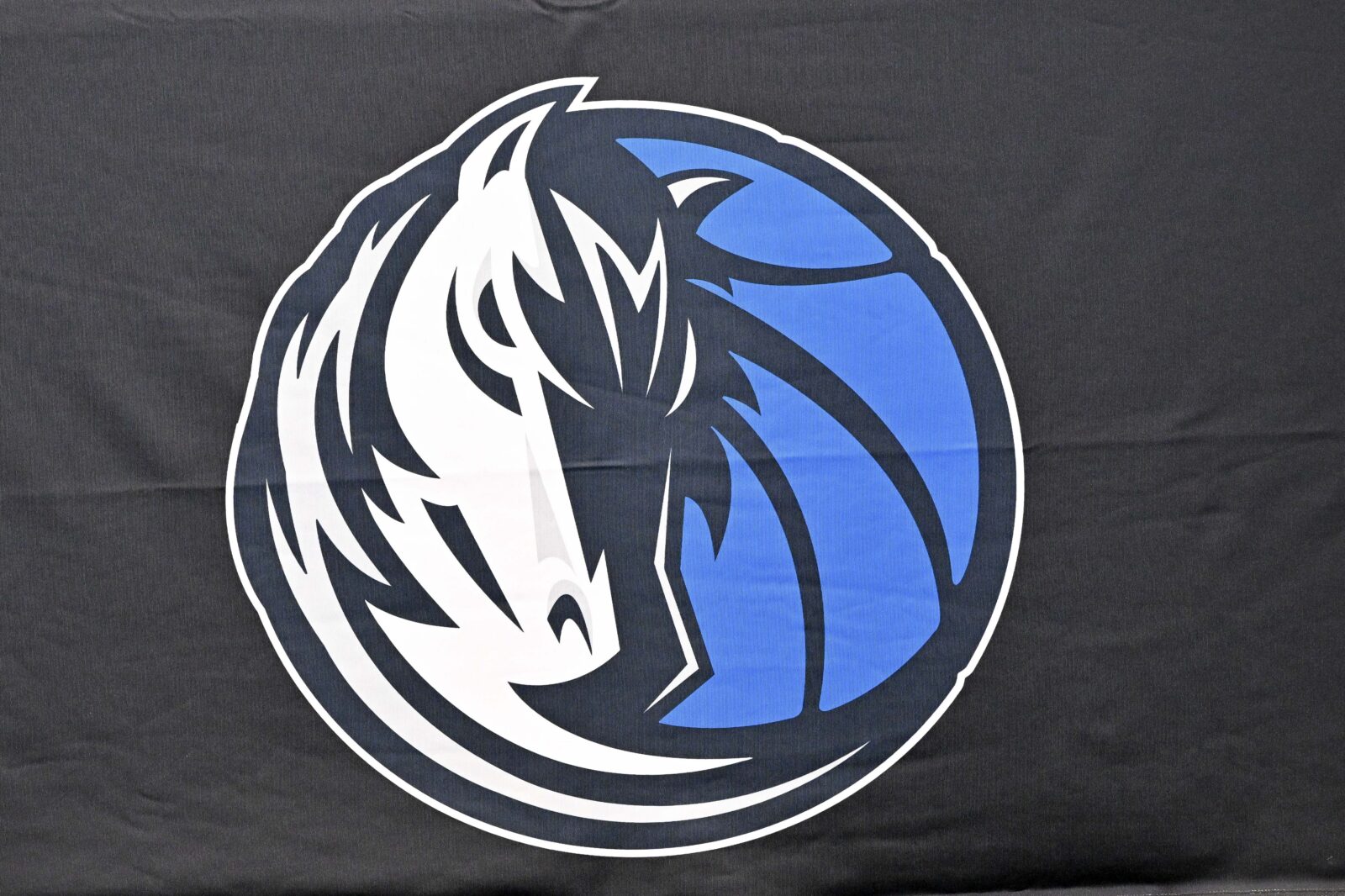 Jun 27, 2025; Dallas, TX, USA; A view of the Dallas Mavericks logo at the Dallas Mavericks Practice Facility. Mandatory Credit: Jerome Miron-Imagn Images