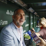 Jul 4, 2025; Chicago, Illinois, USA; St. Louis Cardinals president of baseball operations John Mozeliak speaks before a baseball game against the Chicago Cubs at Wrigley Field. Mandatory Credit: Kamil Krzaczynski-Imagn Images