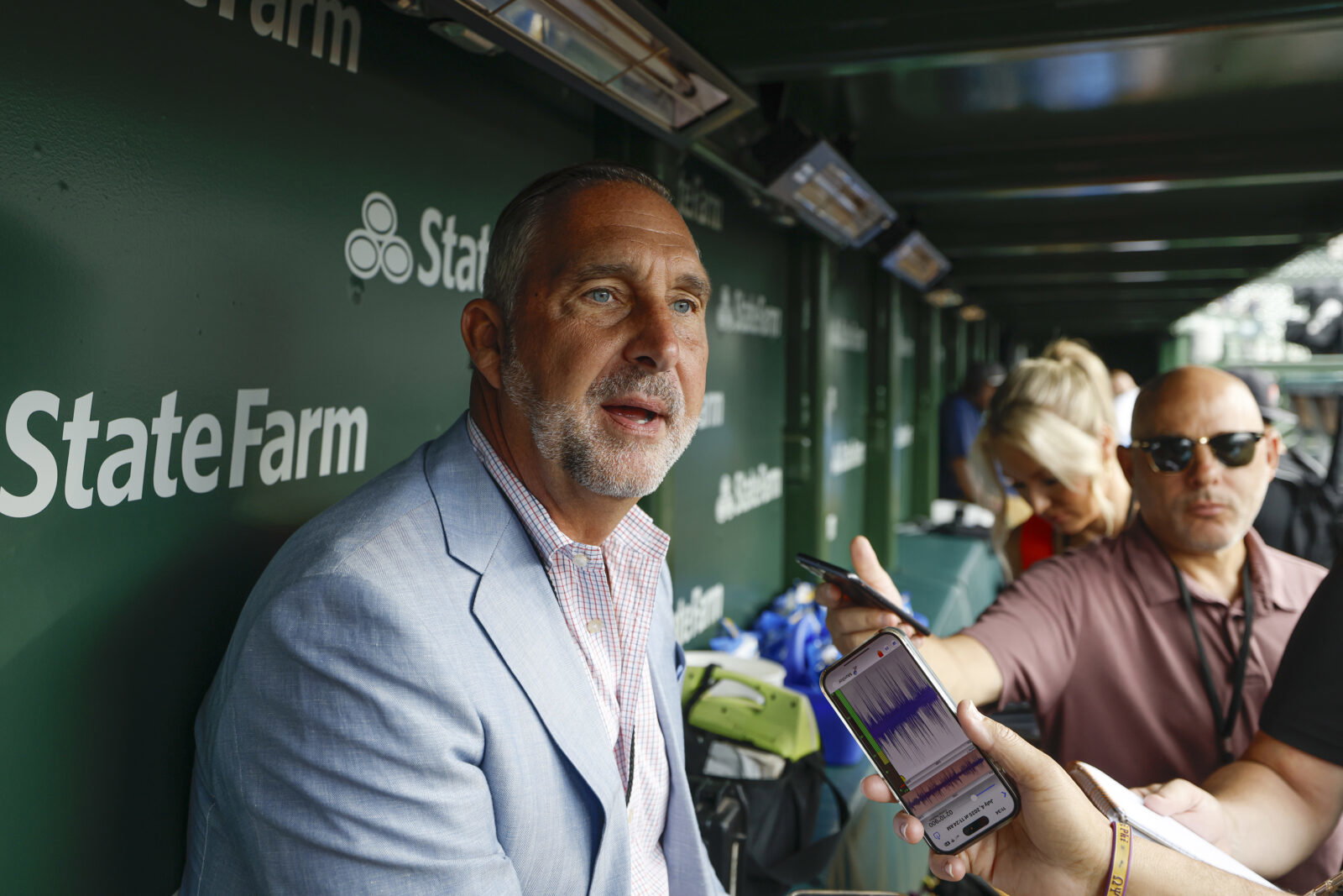 Jul 4, 2025; Chicago, Illinois, USA; St. Louis Cardinals president of baseball operations John Mozeliak speaks before a baseball game against the Chicago Cubs at Wrigley Field. Mandatory Credit: Kamil Krzaczynski-Imagn Images