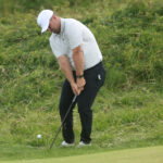 Jul 19, 2025; Portrush, IRL; Chris Gotterup chips on the tenth hole during the third round of The 153rd Open Championship golf tournament. Mandatory Credit: Mike Frey-Imagn Images