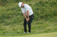 Jul 19, 2025; Portrush, IRL; Chris Gotterup chips on the tenth hole during the third round of The 153rd Open Championship golf tournament. Mandatory Credit: Mike Frey-Imagn Images